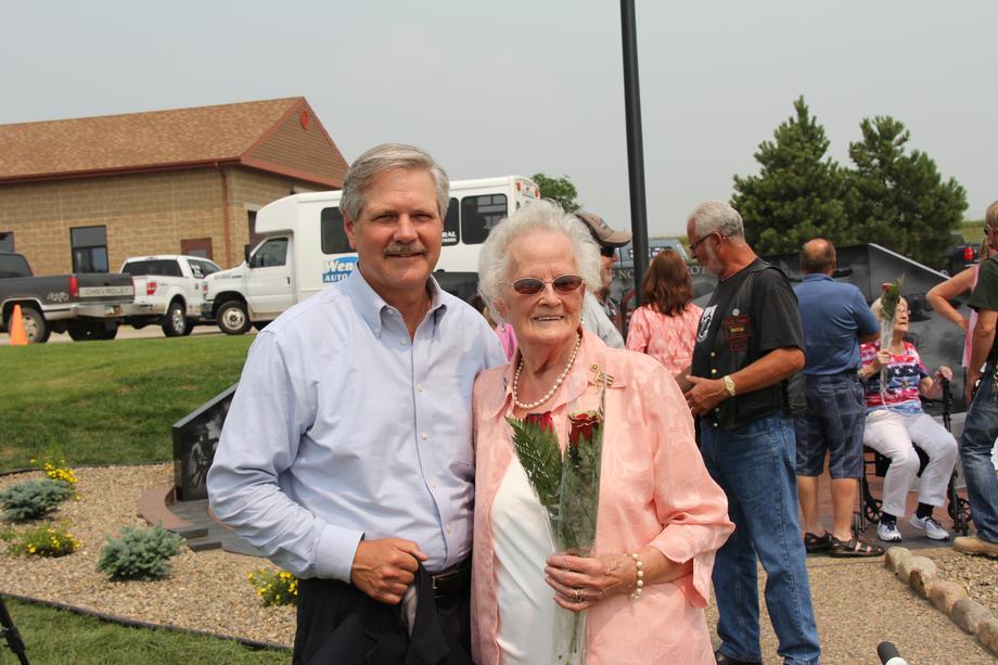 POW/MIA Memorial Dedication-July 2015 - Senator Hoeven visits with Arlene Berdahl, whose son, David, was MIA in Vietnam. As part of Hoeven's POW/MIA Initiative, his office is working with the DPAA to track down information on servicemembers from North Dakota who have been deemed POW/MIA in order to help provide families with the closure they deserve.